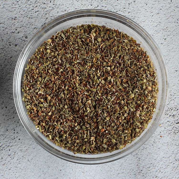 Za'atar Middle Eastern spice mixture in a glass bowl